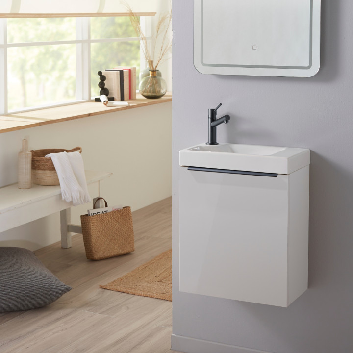 Meuble lave-mains blanc avec vasque en céramique, mitigeur et poignée noire