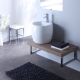 Meuble de salle bain à suspendre équipé d'un lavabo haut design blanc